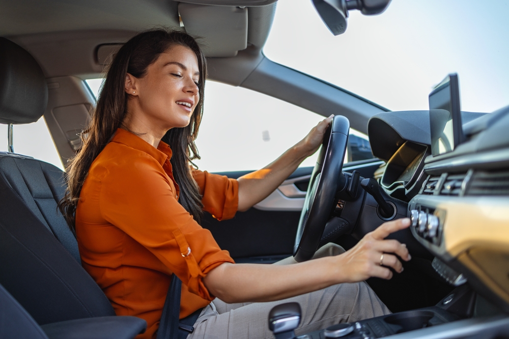 woman with fixed car air conditioner