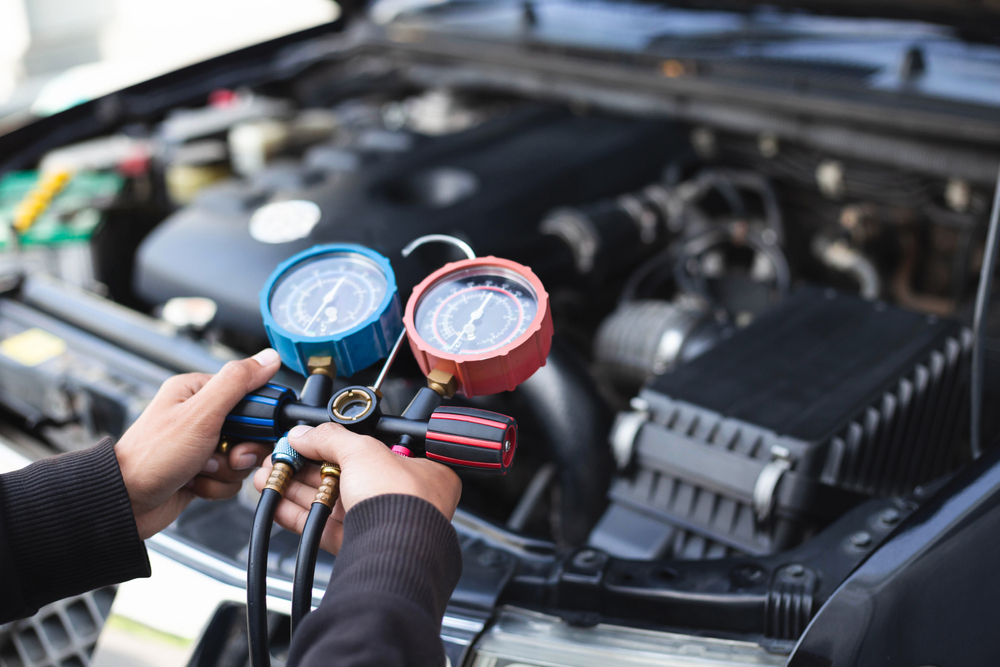 technician working on car ac